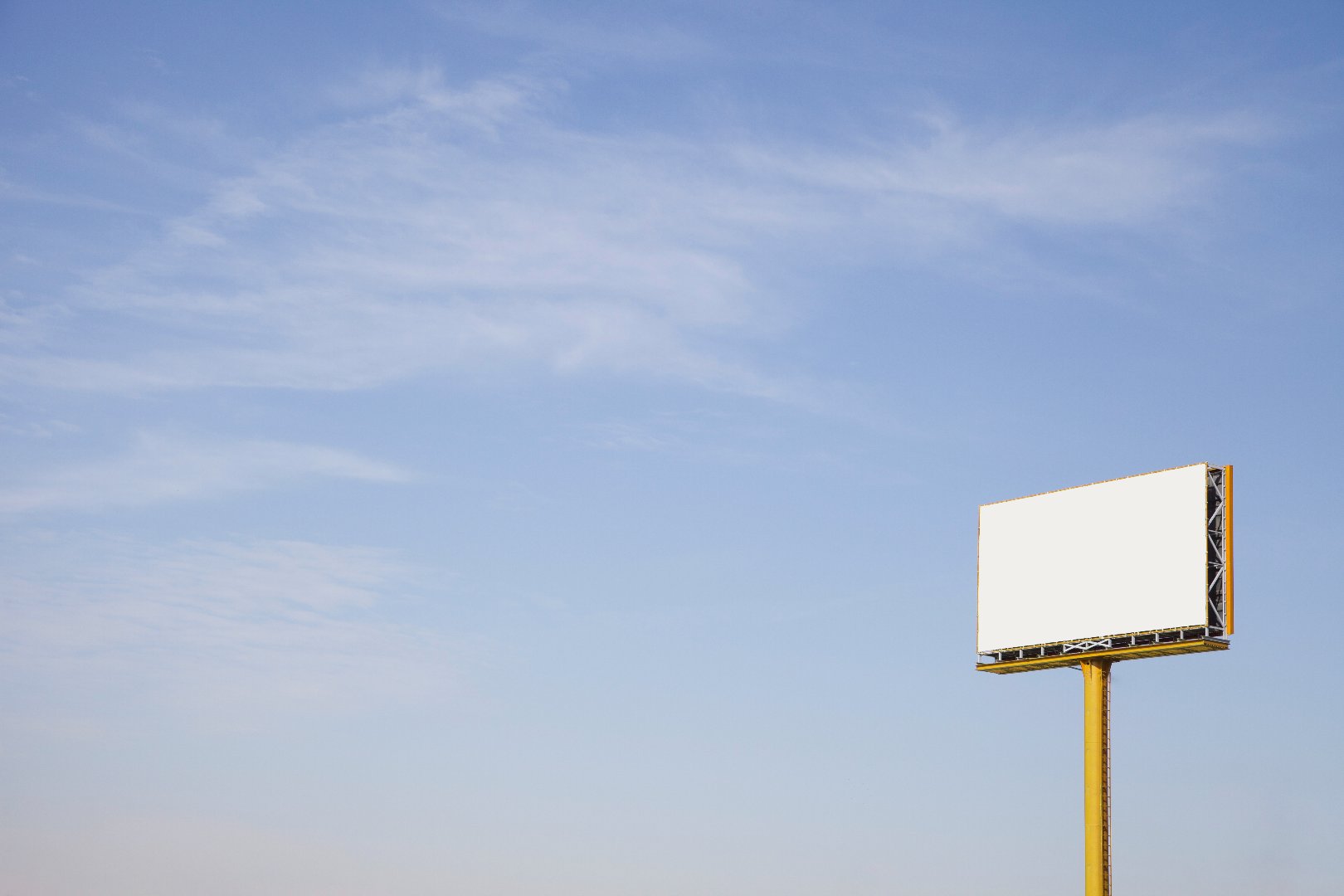 outdoor-empty-advertising-billboard-against-blue-sky.jpg